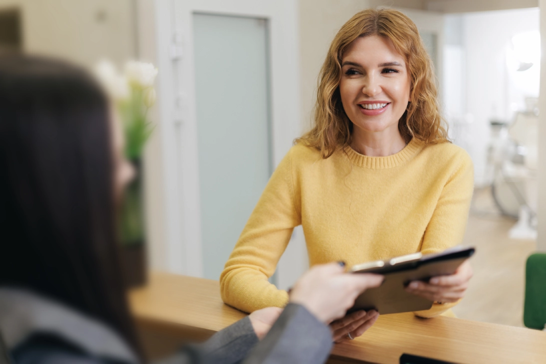 Happy female patient sharing positive results after functional medicine wellness treatment in Peoria AZ
